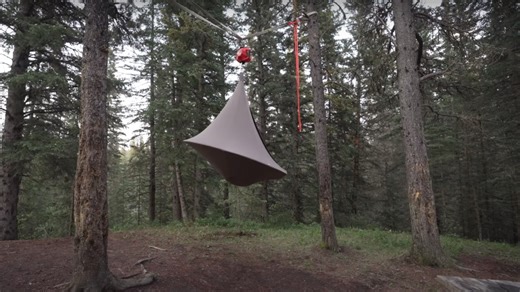 Camper Hangs His Tent Above The Ground Thanks To Electric Lifting Device