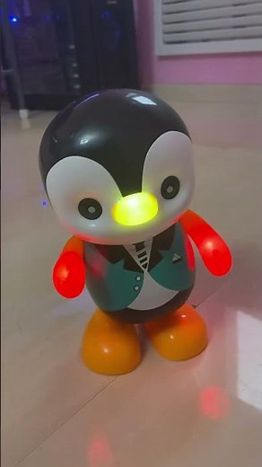 Dancing penguin toy lighting