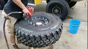 This step-by-step tutorial will guide you through how to mount and assemble a 2-piece 16.5" military wheel on a 37x12.5R16.5 BFGoodrich Baja T/A Hummer / H1 tire (with a runflat installed). While this example uses a 12-bolt rim specifically (the 2nd gen w/ alignment hole), the same steps apply for evenly-spaced 24-bolt wheels, the tandem-style (E-Rated) 24-bolt, and most modified/re-centered Humvee rims as well! | Feltz Tire, LLC