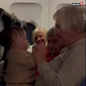 When a baby started to cry during a flight, her mother felt helpless and overwhelmed as she tried to calm her down. That's when three ladies stepped in to help the mother and the baby. #baby #flight #aeroplane #women #elderlywomen #cryingbaby | News18