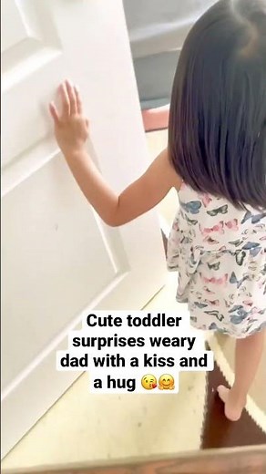 Cute Toddler Gives Weary Dad a Surprise Kiss and Hug