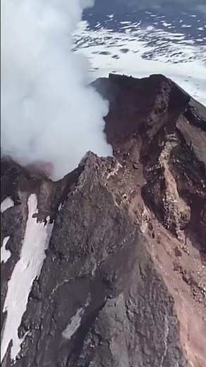 Volcanic activity at Mount Shishaldin in Alaska after vapor plumes are seen