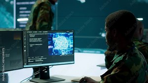 IT programming technician gathering information via neural network and artificial intelligence, employing programming language and new technology to help army operations. Deep learning. Camera A.