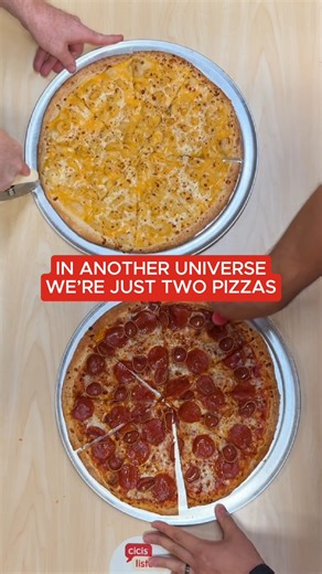 Just two pizzas being sliced on the buffet. | Cicis Pizza