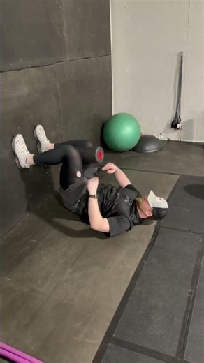 90/90 Hip Shift to Wall w Ovhd Reach