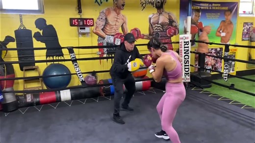 Amanda Serrano unleashing hellacious punches on the hand pads in camp for Meinke March 2nd