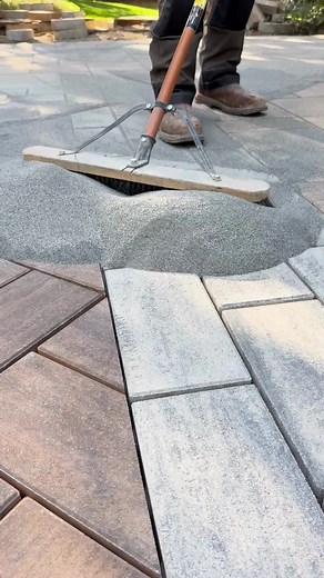 Pressure Washer Safe Jointing Sand: Once installed, apply ROMEX stabilizing sealer to create a permeable and pressure-washer-safe grout. Perfect for driveways and interlocking pavers. Click the link on our profile to learn more! #ROMEX #Hardscape #Landscaping #OutdoorLiving #LandscapeDesign #HardscapeBrotherhood #ASMR #OddlySatisfying