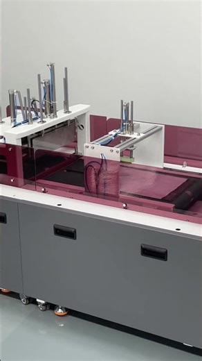 Automatic clothes folding and packing machine