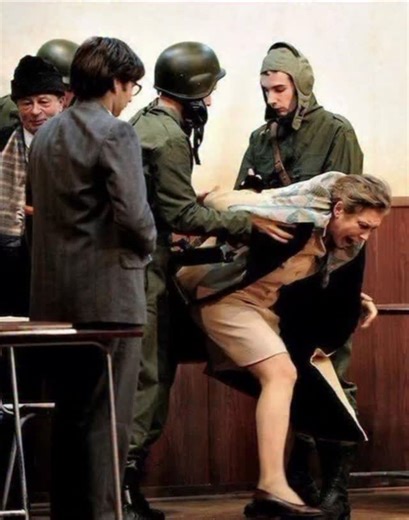 true story's uncovered on Instagram: "Trial and execution of Nicolae and Elena Ceaușescu This is former Romanian dictator Nicolae Ceausescu and his wife being led from the people's courtroom to their EXECUTION in 1989! This happens to leaders who never listen to the people's cry and force their way. Sometimes the whole family is executed! HISTORY REPEATS ITSELF."