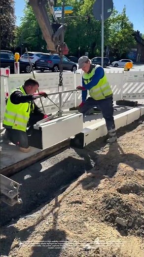 Hoisting Precision: How Road Workers Ensure Perfect Curb Placement