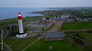 Pointe Saint Mathieu with its signal station, lighthouse and abbey ruins, Finistere, Brittany, France. High quality 4k footage