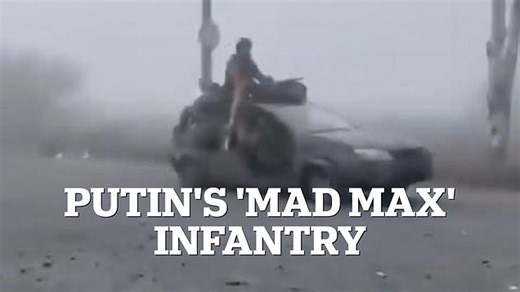Russian column travelling in stripped-back cars advances through fog