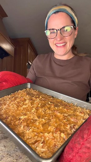 My grandma’s oatmeal cake! A recipe she would make during the holidays and winter months! Ingredients for the cake: 1 cup quick Quaker Oats 1 & 1/2 cups boiling water 1/2 cup unsalted butter 1 cup packed dark brown sugar 1 cup granulated sugar 2 large eggs 1 & 1/2 cups all purpose flour 1 tsp cinnamon 1 tsp baking soda 1/2 tsp salt 1/2 tsp vanilla extract or vanilla bean paste For the topping: 1/2 cup unsalted butter 1/2 cup packed dark brown sugar 1/2 cup heavy cream 1 cup sweetened coconut fla