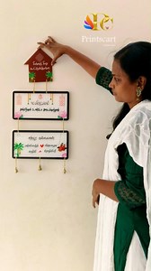 Custom Acrylic Name Board with Luxury Finish. ✔️ Premium glossy finish ✔️ Golden hanging chain ✔️ Decorative bells for a traditional touch ✔️ 100% customizable design #NameBoard #housewarminggift #weddinggifts #weddinggiftideas #homedecor #homedecorideas | Printscart.customize