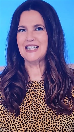 Hollywood Squares with Drew Barrymore center square and Anthony Anderson.