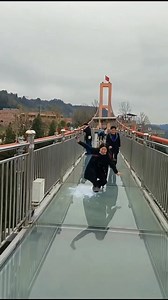 LOL! 😂The shattered glass effects on these glass bridges in Chinese scenic spots are scaring the life out of tourists! #adventure #glassbridge #lol #shatteredglass #tourism #funny #Heartquake #glassbridgewalk #tours | Shanghai Daily 上海日报