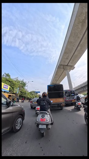 BMTC Bus Tries Barricade Shortcut—Jam & Drama for All! 🚌🚧 A BMTC bus driver forces his way toward a barricaded route, gets stuck, and ends up arguing with the traffic cop. Meanwhile, the rest of the road turns into a parking lot. These small acts of impatience snowball into massive jams that thousands pay for. Urban traffic isn’t magic — it’s discipline. #CityTraffic #TrafficJamLife #RoadReality #BMTC #TrafficTrouble #SignalMess #PublicTransportIssues #RoadAwareness #UrbanChaos #RespectTraffic