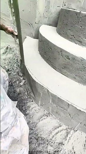 Cutting the Line: How a Long-Handled Blade Defines a Concrete Stair's Edge