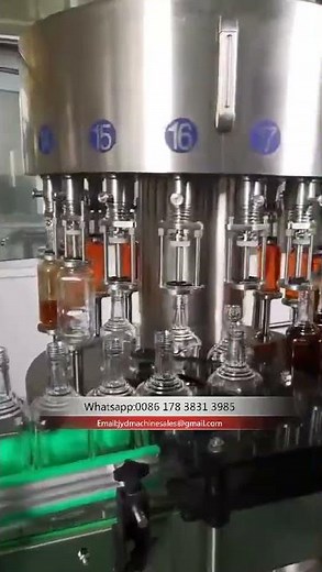 Rotary Liquid Bottle Filling Machine Fully Automatic #fillingmachine #liquidfilling #bottlefiller