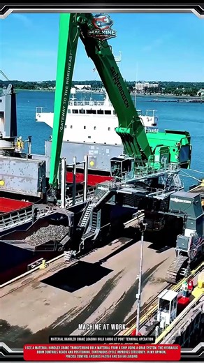 Material handler crane loading bulk cargo at port terminal operation