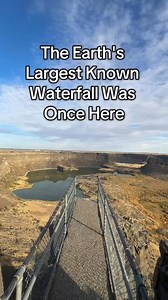 🌊 Dry Falls, Grant County, WA — one of the most mind-blowing places in the Pacific Northwest 🤯 What looks like a massive cliff today was once the largest waterfall in the world during the Ice Age floods — nearly 4x bigger than Niagara. Standing here feels like stepping back in time to witness the raw power that shaped the Columbia Basin. If you love geology, hidden history, and unreal landscapes… this spot is a must-see. 🏞️✨ #pnw #pacificnorthwest #washingtonstate #grantcountywa | Compass Out