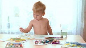 clip-1052656472-boy-three-years-scratched-himself-continued-paint