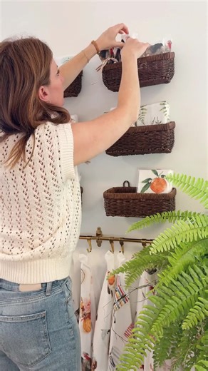 Emily Lex on Instagram: "We added a new display in the shop with woven wall baskets filled with our favorite tea towels. Cute, simple, and ready for everyday use 🧺✨ #elstudio #elswatercolor #teatowels"
