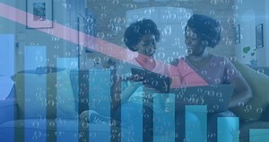Animation of statistical data processing over african american mother and daughter using laptop. Global economy and business technology concept