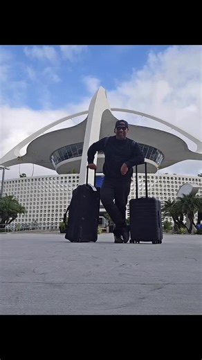 Neneki "Nick" McGee on Instagram: "Standing in front of the Paul R. Williams futuristic Theme building at LAX ✈️🖤 Paul Williams wasn’t just an architect — he was a visionary, a pioneer, and a hero. As an artist, I’m inspired by his excellence, his design, and the legacy he built even when the world tried to limit him. And with history being rewritten and erased by some leaders today… moments like this matter even more. Honoring a legend. Respecting the blueprint. #BlackHistoryMonth #AmericanHis