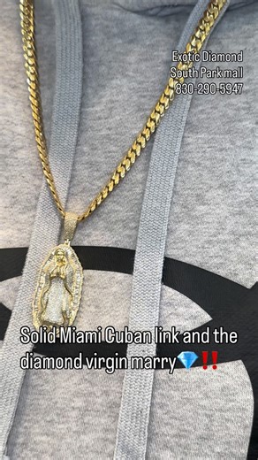 Exotic Diamonds on Instagram: "Solid Miami Cuban link chain and a diamond Virgin Mary charm💎‼️ he saw us online and had to come check us out in person🔥 best deals all year long and biggest selection come check us out❤️ #gold #diamonds #chain #charm #best"