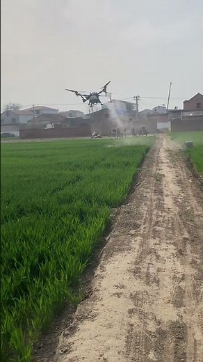 Watering fields using a drone.#dronefarming #modernfarming #agriculture #technology #fyp #shorts