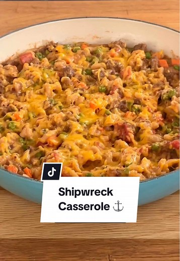 Shipwreck Casserole is your new go-to, one-pan dinner! 🍽️ While it may not be the prettiest casserole, it's still just as tasty and extremely easy to make! Click the link in the @allrecipes bio for the full recipe or keep reading. 😉 Ingredients: 1 pound lean ground beef 1 (7.25 ounce) package macaroni and cheese mix 1 (14.5 ounce) can diced tomatoes 1 cup milk 1 cup frozen peas 1 cup frozen corn 1 teaspoon seasoned salt or to taste 1 cup shredded Cheddar cheese, divided Directions: Heat a larg