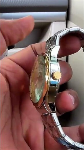 Forest men's analog quartz watch, featuring :- a gold-tone finish, a day-date display,