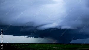 Massive Supercell Thunderstorm Rotating Over a Plain in Time-Lapse