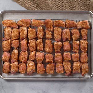 Sugar Free Sweet & Spicy Bacon Wrapped Chicken Bites! A low carb, keto, easy, finger food appetizer for any party! https://www.sugarfreemom.com/recipes/sugar-free-sweet-spicy-bacon-chicken-bites/ | SugarFreeMom.com