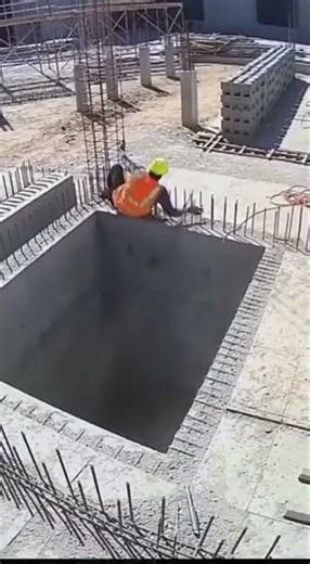 Worker Rescues Dog from Deep Pit