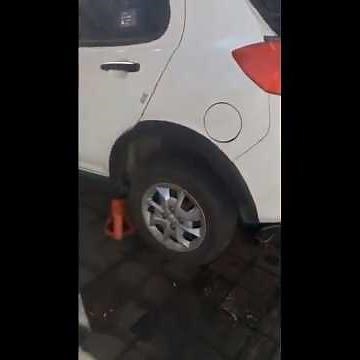 Rear Suspension Repair: How to Remove Coil Spring and Damper