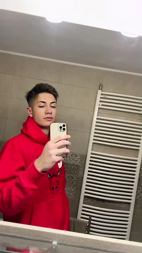 Selfie Moments in a Unique Red Hoodie