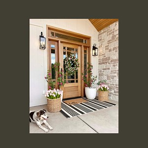 Summer porch decor! Comment PORCH and I’ll send you links to everything!! I started with a large striped rug. Then layered with a smaller coir mat. Added some large planters with some artificial trees! These artificial dogwood trees are some of my favorites! They are so pretty! I also added some artificial potted tulips! And a tulip wreath! !🌷🌷#LTKit#outdoorliving #patiodecor #frontporch #porch #springdecor #porchdecor #porchgoals #frontporchdecor #frontporch #homedecor #homeinspo #houseandhom