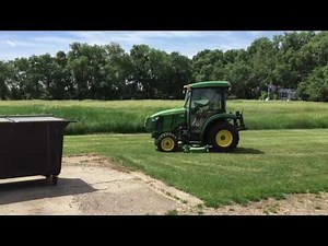 John Deere 3046R mowing