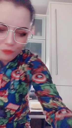 Superhero Shirt Conversation in a Modern Kitchen