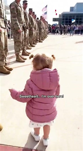 Toddler finds her dad in the military lineup and demands a treat #militaryreunion #homecoming