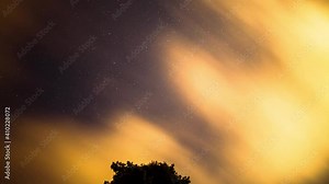 Time lapse astrophotography summer triangle night sky star field with earths rotation