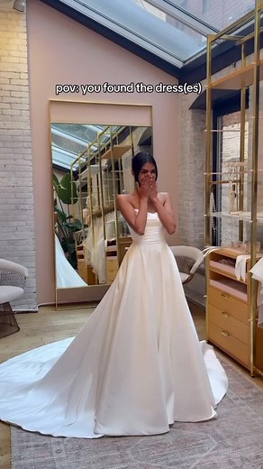 We will forever say yes to a versatile look! ✨ Pro tip: wear an overskirt for your ceremony to add extra drama for walking down the aisle. @ashnagray fell in love with our @louvienne ZUKO paired with the Newton overskirt at @lovelybridenyc. #weddingtiktok #weddingdress #bridalshop #lovelybride #bridetobe #bride #weddingdressshopping