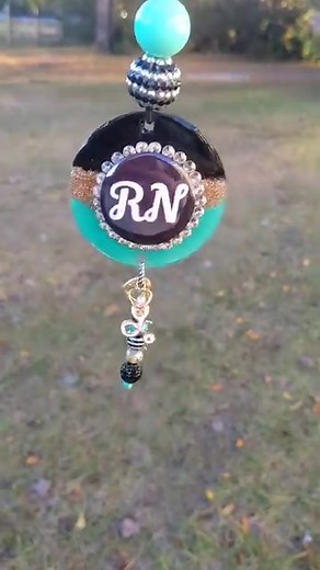 3.4K views · 52 reactions | RN rear view mirror car charm!!! I made this for a customer. If anyone else is interested please comment I will make a listing tonight if so. And yes I can change the title or put a name and title if you prefer. I personally love these colors together and think this looks very nice. #nurse #RN #nurselife #nursegift #carcharm | Royal Ruby Boutique | Facebook