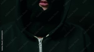 Caucasian Criminal Takes Gun out of Pocket, Then Looks Around. Shot with ARRI Alexa in ARRIRAW and exported QuickTime Apple ProRes 422 HQ.