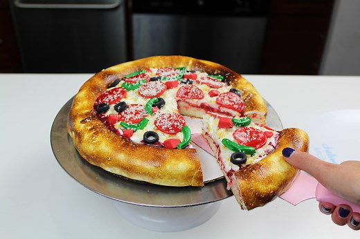 36K views · 575 reactions | To celebrate one of my favorite foods, I've decided to make a Pizza Cake!! This cake is made with half a batch of my favorite vanilla layer cake recipe, some of my classic american buttercream, and a Satin Ice fondant crust/toppings! I was inspired by Yolanda Gampp, who showed how easy it is to caramelize fondant using a kitchen torch on her channel How to Cake It :) | Chelsweets | Facebook