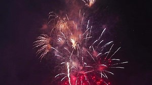 big beautiful colorful festive fireworks display at the celebration of pyrotechnic show in the night sky