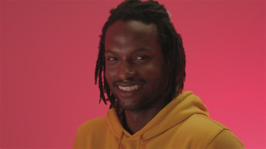 Face of a man winking at the camera - Free Stock Video