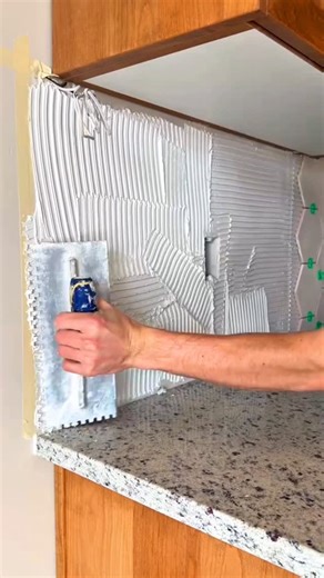 Installing our Hexagon Basic White Porcelain Tile backsplash 🤍 Check out the other colors and styles on our site! Which one’s your fave?🤔😍 #hexagontiles #kitcheninteriors #backsplashtile | Tile Merchant Ireland